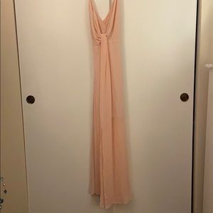 Plunging long dress with criss cross back